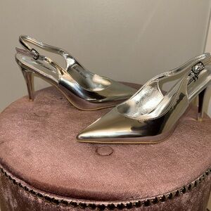 These shoes are lovely, but did not go with my outfit. Never worn